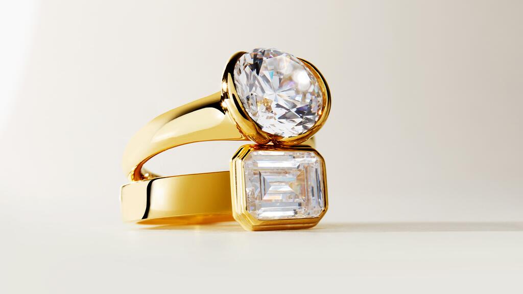 From top to bottom, the “Liora” solitaire ring in 14-karat yellow gold ($2,680) and a ring coming soon from the “Auravie” bridal collection ($2,680). Sylvie Jewelry Shell Auranova Liora Engagement Ring and Auravie Engagement Ring