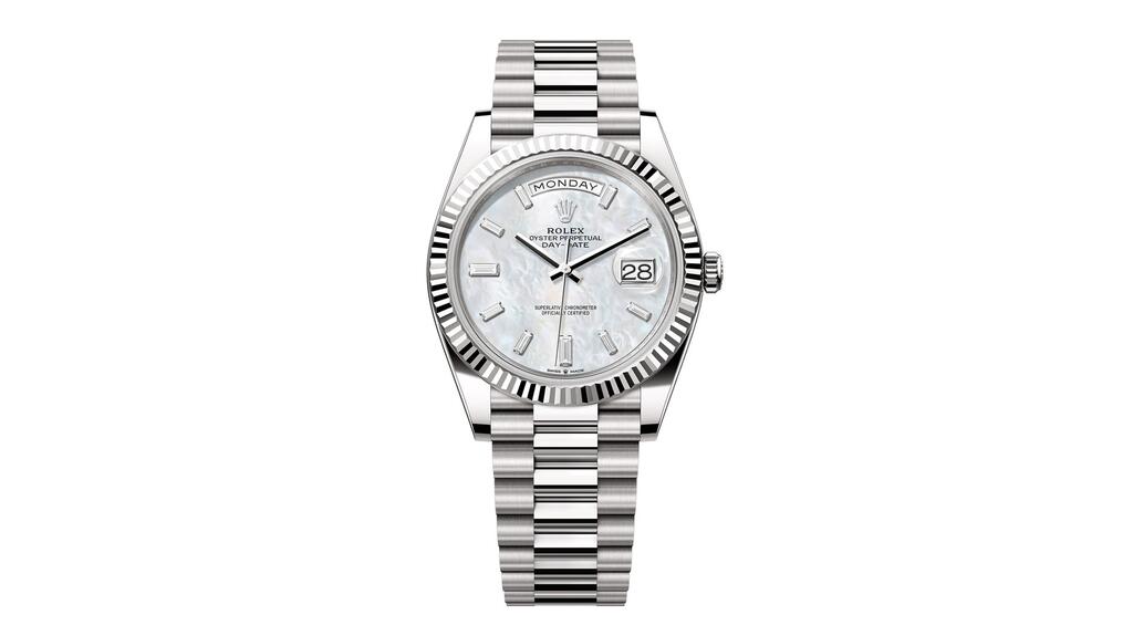 More women are opting for watches with a 40 mm case and above, like this Rolex Day-Date 40 in 18-karat white gold with mother-of-pearl dial and 10 baguette-cut diamonds as the hour markers ($47,050). (Image courtesy of Rolex) Rolex Day-Date 40