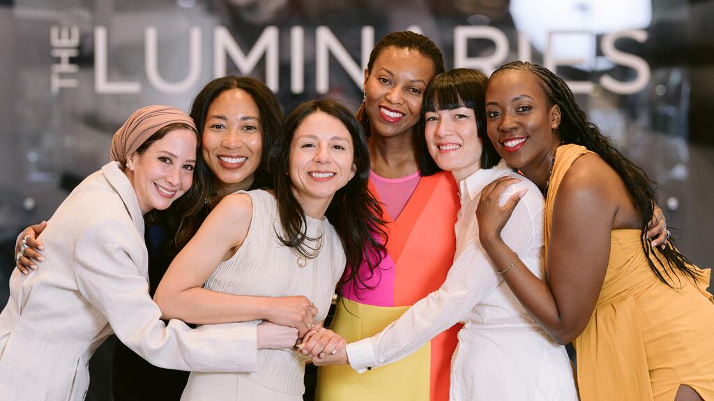 The Luminaries by Couture are, from left to right, Hiba Husayni of Zahn-Z Fine Jewelry, Sasha Flynn of Adore-Adorn, Casey Perez, Alexia Connellan, Bliss Lau, and Ama McKinley of Ilium Wing. The seventh DAC mentee, Ope Omojola of Octave Jewelry, continues to be a part of the program but did not participate in Couture this year. The Luminaries by Couture second cohort