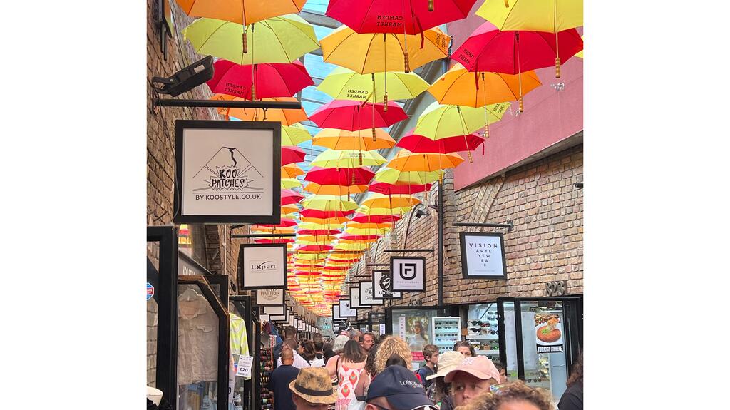 Peter Smith shared this snap of the colorful ceiling of umbrellas at Camden Market he spied while on vacation in London. Colorful umbrellas Camden Market