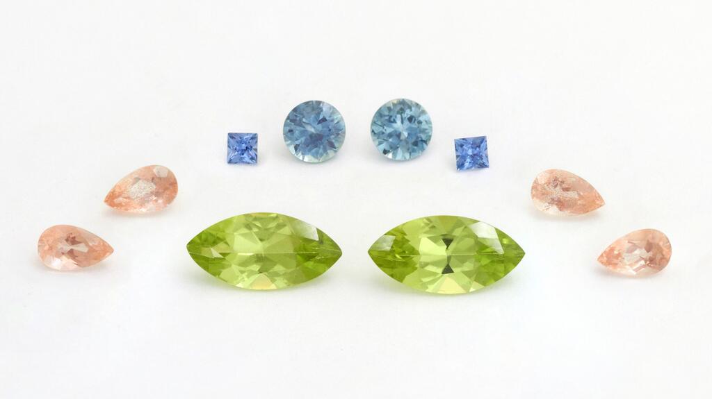 Montana Sapphire, Oregon Sunstone, Yogo Sapphire, and Mesa Verde Peridot from Arizona are featured in the jewelry pieces that will be raffled off in Columbia Gem House’s “Pebbles to Pines” fundraiser. Columbia Gem House Sapphire, Sunstone, Peridot