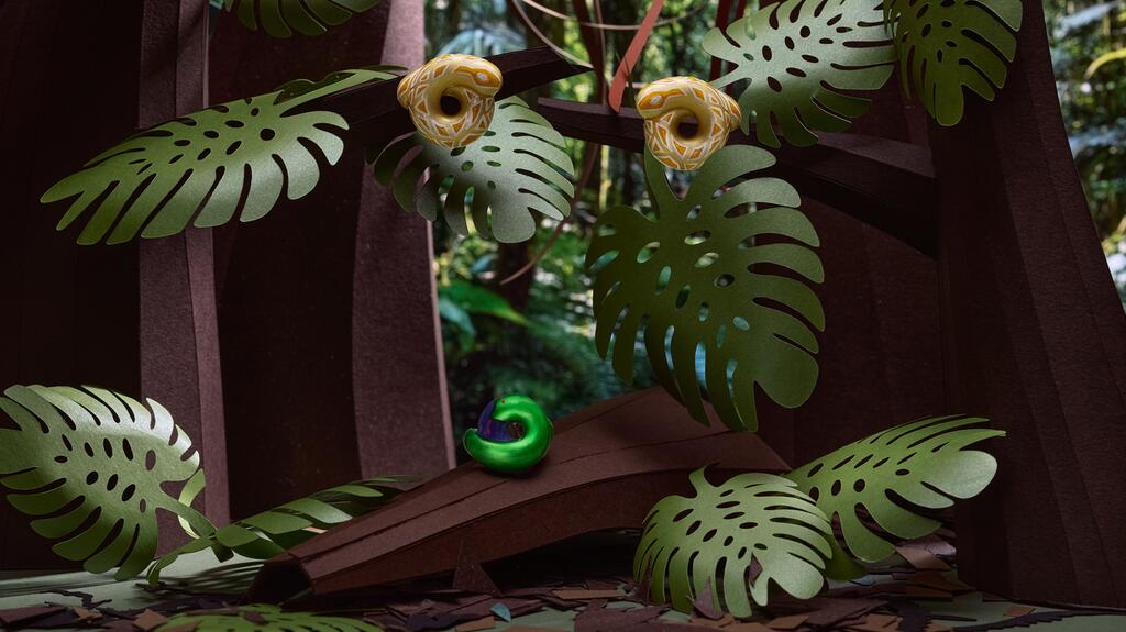 Seen in one of Mauro Seresini’s paper scenes are the one-of-a-kind “Albino Burmese Python Tarallo” earrings, at top, and, at bottom, is the one-of-a-kind “Snake Tarallo” custom ring (prices starting at $1,000 and $920, respectively) Bea Bongiasca Mauro Seresini Paper Scene Albino Burmese Python Tarallo Earrings and Snake Tarallo Ring