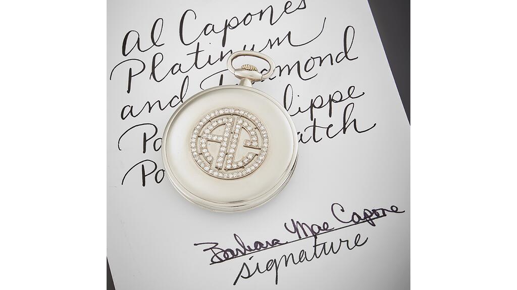 Al Capone’s pocket watch sits atop a paper with his granddaughter Barbara Capone’s signature. His widow, Mae Capone, left his heirlooms to their only child, Sonny, and their son’s daughters Barbara, Diane, and Ronnie. Al Capone pocket watch