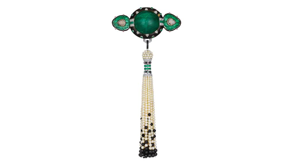 A Cartier shoulder brooch, circa 1924 Cartier Art Deco multi-gem and diamond shoulder brooch
