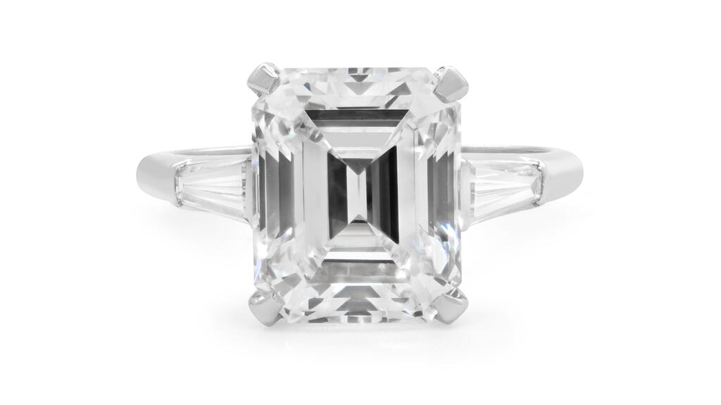 Rings featuring an emerald-cut diamond with tapered baguette side stones have been around since the 1930s but didn’t become popular until Grace Kelly’s engagement to Prince Rainier III of Monaco in 1956. Part of the collection of estate jewelry dealer Beladora, the ring pictured is from 1965 and is mounted in platinum. (Photo courtesy of Marion Fasel) Beladora Emerald Cut Engagement Ring
