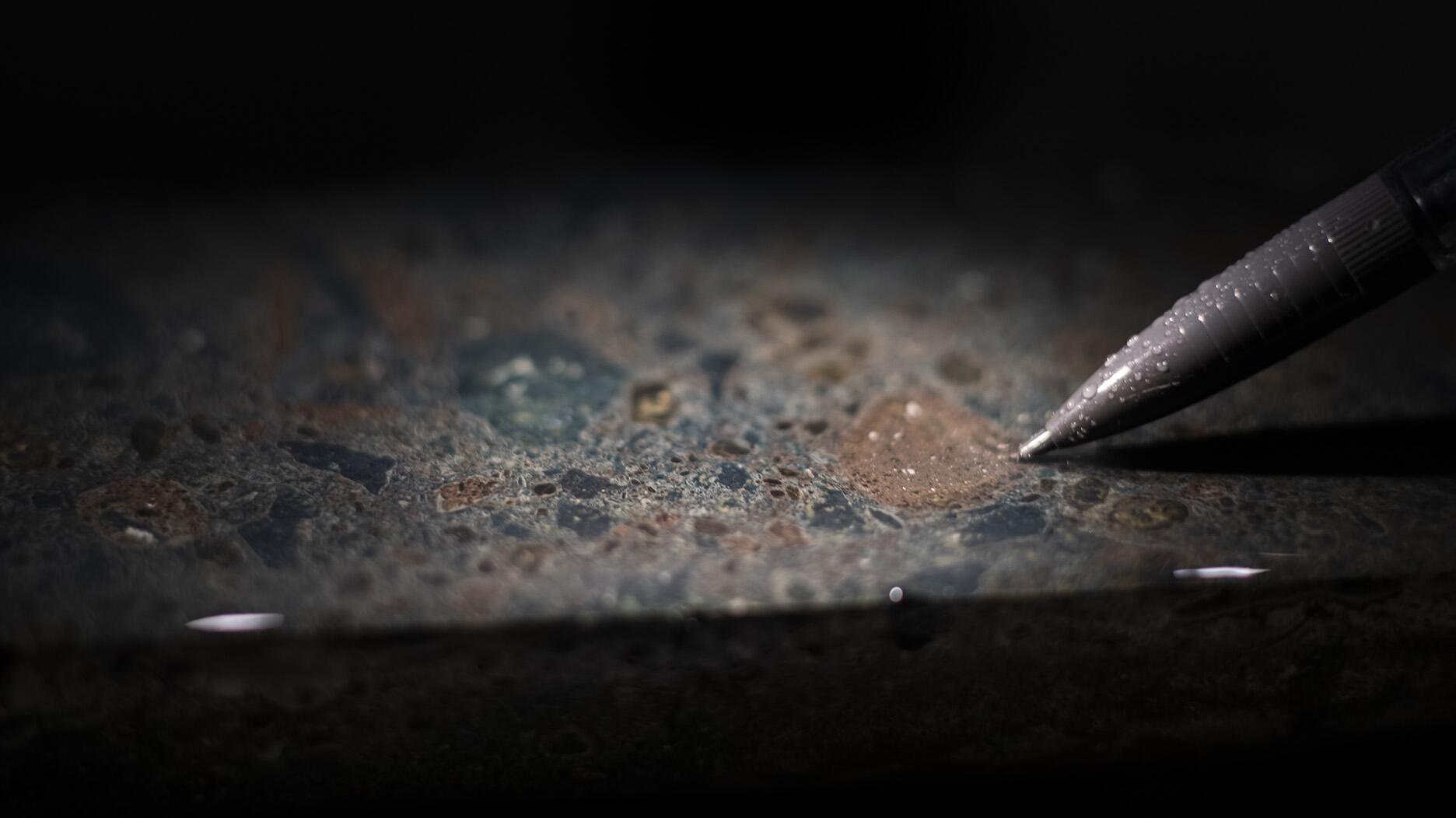 A close-up of a rock core sample from a De Beers Group operation in Calgary, Alberta, Canada. The diamond miner and marketer announced Wednesday that it will begin exploration in a new country later this year—Angola. (Photo © De Beers Group/Credit: Ben Perry @ Armoury Films) 2022_De Beers rock core sample exploration.jpg