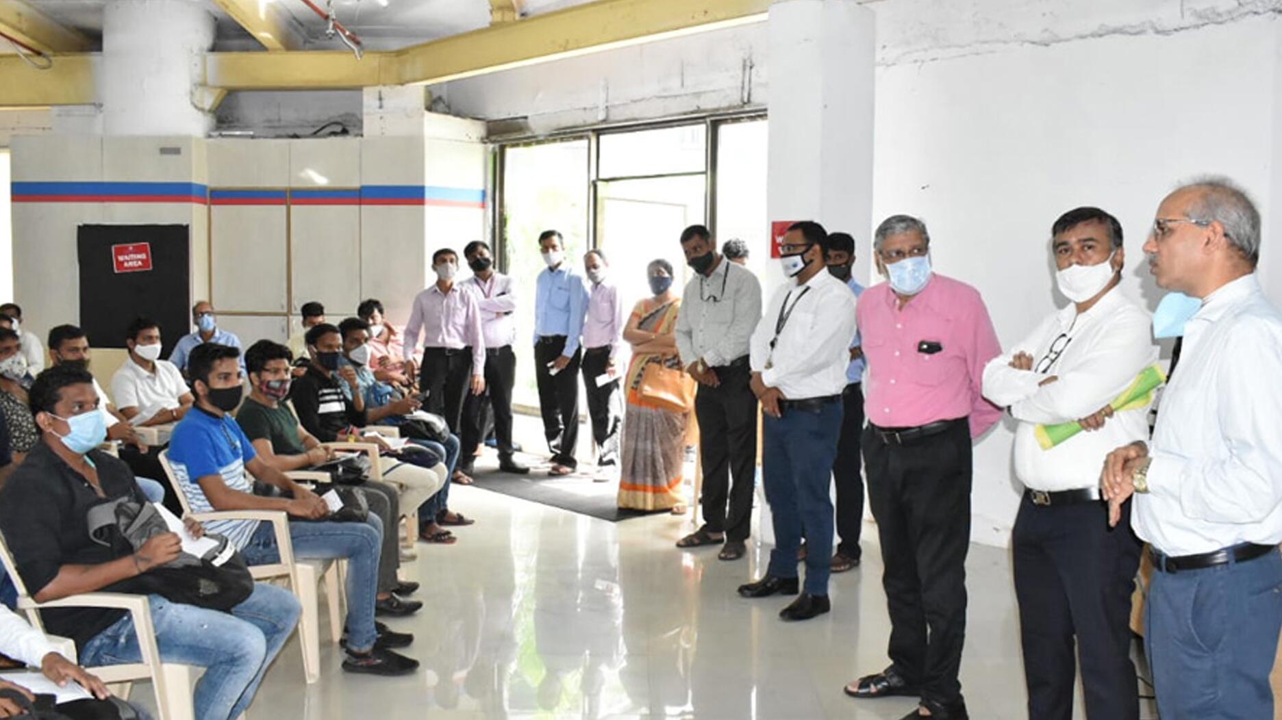 Gathering at Bharat Diamond Bourse for COVID vaccinations   