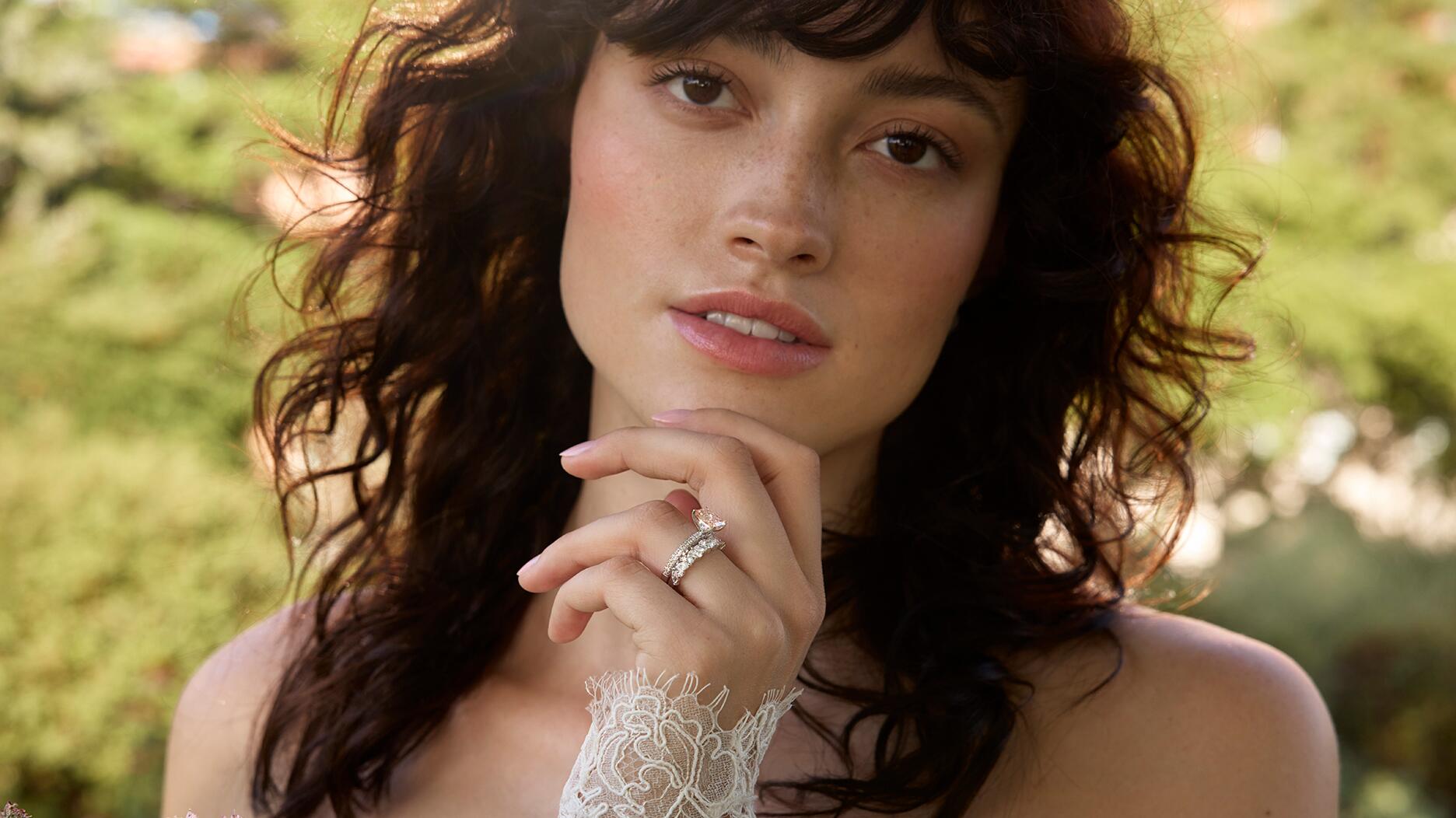 Kay Jewelers has added colored lab-grown diamonds to the “Monique Lhuillier Bliss” engagement ring collection, with the diamonds serving as both center and side stones. Monique Lhuillier Bliss lab-grown colored diamond campaign image