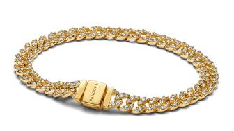 A Pandora 14-karat gold-plated Cuban chain bracelet with cubic zirconia pavé ($395). The Danish jeweler reported organic sales growth of 11 percent in the third quarter. Pandora cuban link bracelet