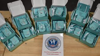 U.S. Customs and Border Protection officers in Champlain, New York seized several shipments of counterfeit Tiffany & Co. jewelry between December 2024 and Jan. 6, 2025. (Image courtesy of U.S. Customs and Border Protection) Counterfeit Tiffany & Co. jewelry near U.S. Customs and Border Protection logo