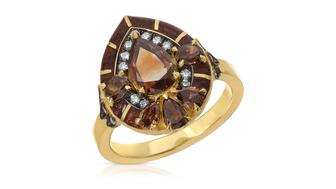 This Amanda’s Style File harnesses Pantone’s 2025 Color of the Year, Mocha Mousse, across 20 pieces. Seen here is a ring by Lord Jewelry featuring brown and white diamonds ($9,500). Lord Jewelry brown and white diamond ring