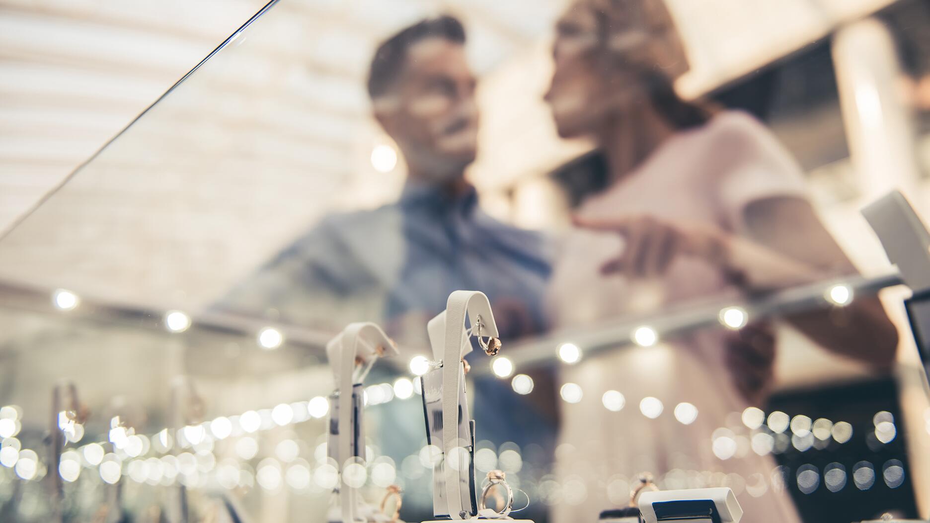 The Conference Board’s Consumer Confidence Index declined again in January, slipping to 104.1. Consumers surveyed were more pessimistic about the current job market and are concerned about lingering inflation and recent signals from the Federal Reserve that the pace of interest rate cuts will slow in 2025. Stock image of couple shopping for jewelry