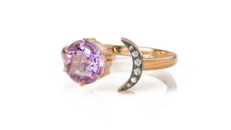 From everyday staples to design-forward pieces, amethyst is a gemstone seen across many facets of fine jewelry. Seen here is Seal & Scribe’s “Freedom Moon” ring with hand-carved amethyst depicting a bird flying free of its cage ($3,200), one of the 16 selects in this month’s Amanda’s Style File. Seal & Scribe “Freedom Moon” Ring