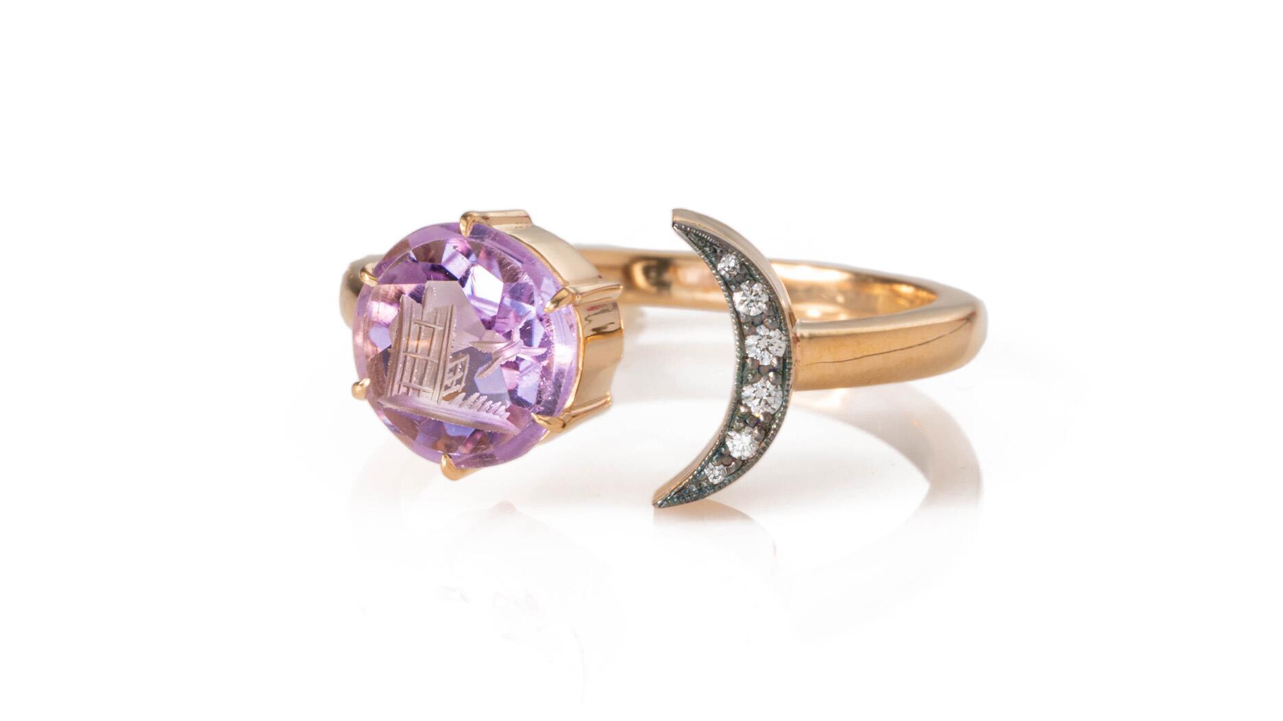 From everyday staples to design-forward pieces, amethyst is a gemstone seen across many facets of fine jewelry. Seen here is Seal & Scribe’s “Freedom Moon” ring with hand-carved amethyst depicting a bird flying free of its cage ($3,200), one of the 16 selects in this month’s Amanda’s Style File. Seal & Scribe “Freedom Moon” Ring