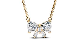 A 14-karat gold-plated “Sparkling Bow” necklace set with cubic zirconia by Pandora ($225). The jewelry retailer posted strong results in 2024. Pandora sparkling bow necklace
