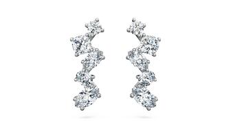 A pair of earrings set with Swarovski Created Diamonds from the brand’s “Galaxy” collection. Swarovski posted strong sales for 2024. Swarovski lab-grown diamond Galaxy earrings