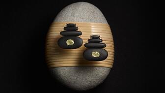 Sauer Creative Director Stephanie Wenk designed the brand’s latest collection with organic shapes, dualities, and references to Zen gardens, river pebbles, and rippling water. Seen here are the “Balance” earrings made from pebble stones with diamond accents set in 18-karat yellow gold ($20,500). Sauer Balance Earrings in Ma Campaign