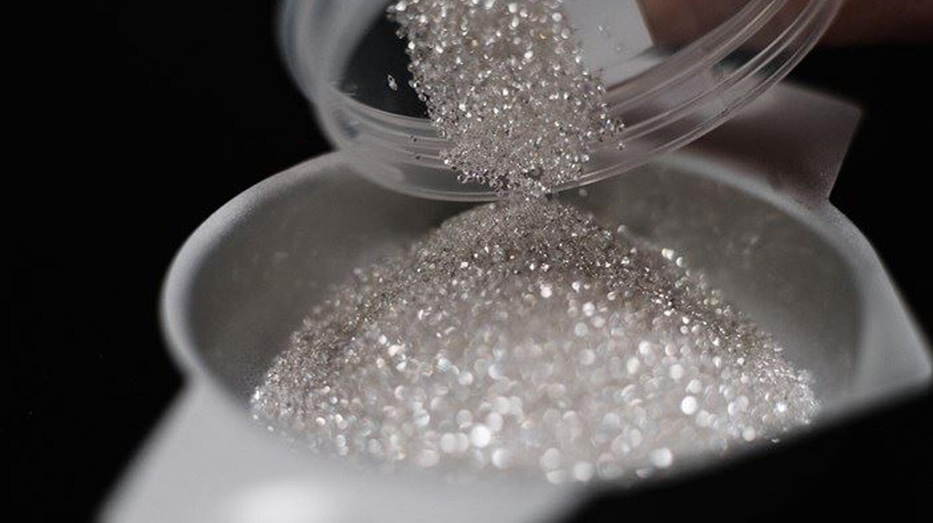 De Beers Group reported Thursday that its production was down 11 percent year-over-year in the first quarter of 2025 while rough diamond revenue dropped 44 percent year-over-year. (Photo courtesy of De Beers Group) Melee diamonds from De Beers