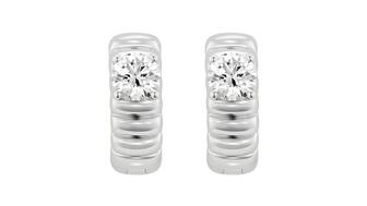 De Beers Group just announced it was shutting down Lightbox, the lab-grown diamond fashion jewelry brand it launched in 2018. Pictured are the brand’s “Poet” earrings in 14-karat white gold with lab-grown diamonds from the “Reminiscence” collection, introduced in fall 2024. Lightbox’s Reminiscence Poet earrings in 14-karat white gold with lab-grown diamonds