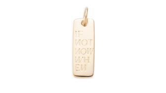 Foundrae’s “Ingot” pendant features eight to 10 grams of gold or silver that has been melted down and repurposed for the piece; clients may customize the front of the pendant with an engraving. Foundrae Ingot Pendant