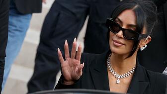 Kim Kardashian arrived at the Palais de Justice in Paris on May 13 to testify in the robbery trial wearing a handful of diamond jewels, including a necklace from Samer Halimeh New York priced at $3 million. (Photo courtesy of Samer Halimeh New York) Kim Kardashian