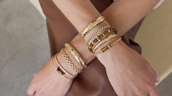 Zoë Chicco, one of the designers who spoke on the uncertainty tariffs have caused for her brand, has chosen to incorporate more budget-friendly gemstones, like tiger’s eye, into her latest collection. Seen here are a variety of bracelets by Chicco, using 14-karat yellow gold with tiger’s eye and diamonds. Zoë Chicco Bracelets