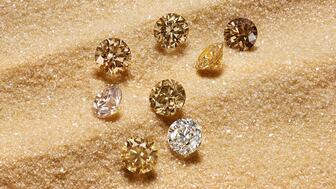 At JCK Las Vegas, De Beers Group announced a new “beacon” program for the industry centered on “desert diamonds”—off-white, light yellow-, and brown-colored diamonds that both reflect their desert origins and are easily differentiated from lab-grown diamonds. (Photo courtesy of De Beers Group) De Beers desert diamonds