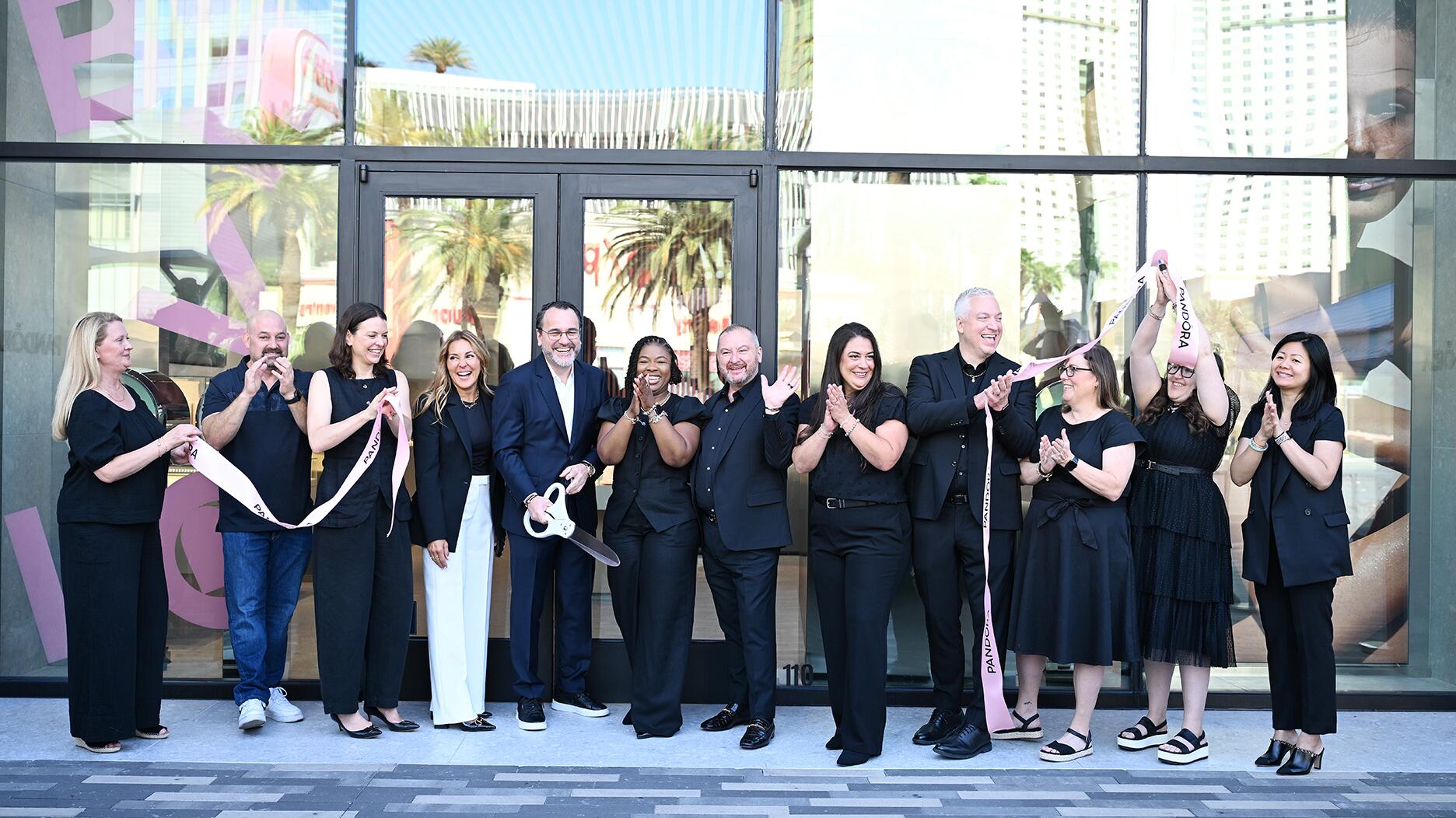 Luciano Rodembusch, general manager of North America at Pandora, cut the ribbon alongside members of the Pandora team to commemorate the opening of the brand’s Las Vegas store. (Photo by Denise Truscello/Getty Images for Pandora) Pandora Las Vegas ribbon cutting ceremony