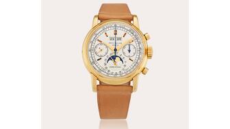 This pink gold Patek Philippe perpetual calendar chronograph Ref. 2499 was the top lot in Sotheby’s “Important Watches: Take a Minute” auction, held Tuesday in New York. A buyer paid $4.3 million for the watch, which was made in 1957 and features the retailer’s name (Gobbi Milano) beneath the moon phase complication. (Photo courtesy of Sotheby’s) A pink gold Patek Philippe perpetual calendar chronograph Ref. 2499